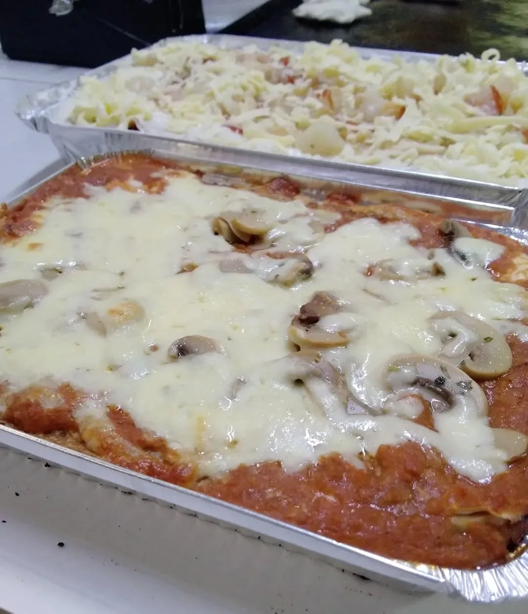 Lasaña romana y lasaña marinera de Empanadas Mauricio